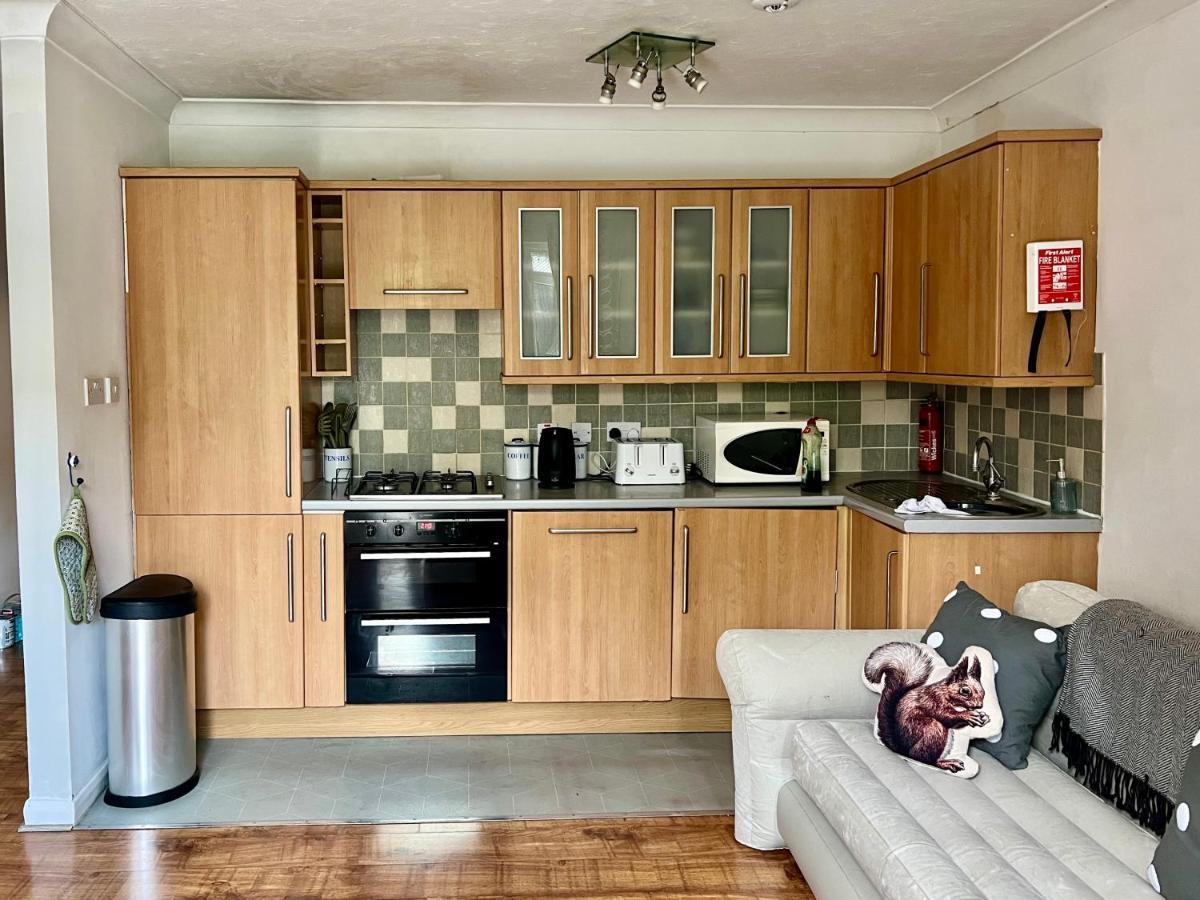 Large Balcony Opposite Rail Station Apartment London