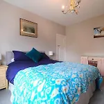 A Beautiful And Welcoming Home And Garden