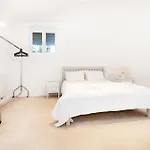 Elegant 2-Bedroom Getaway W Terrace & Garden Views