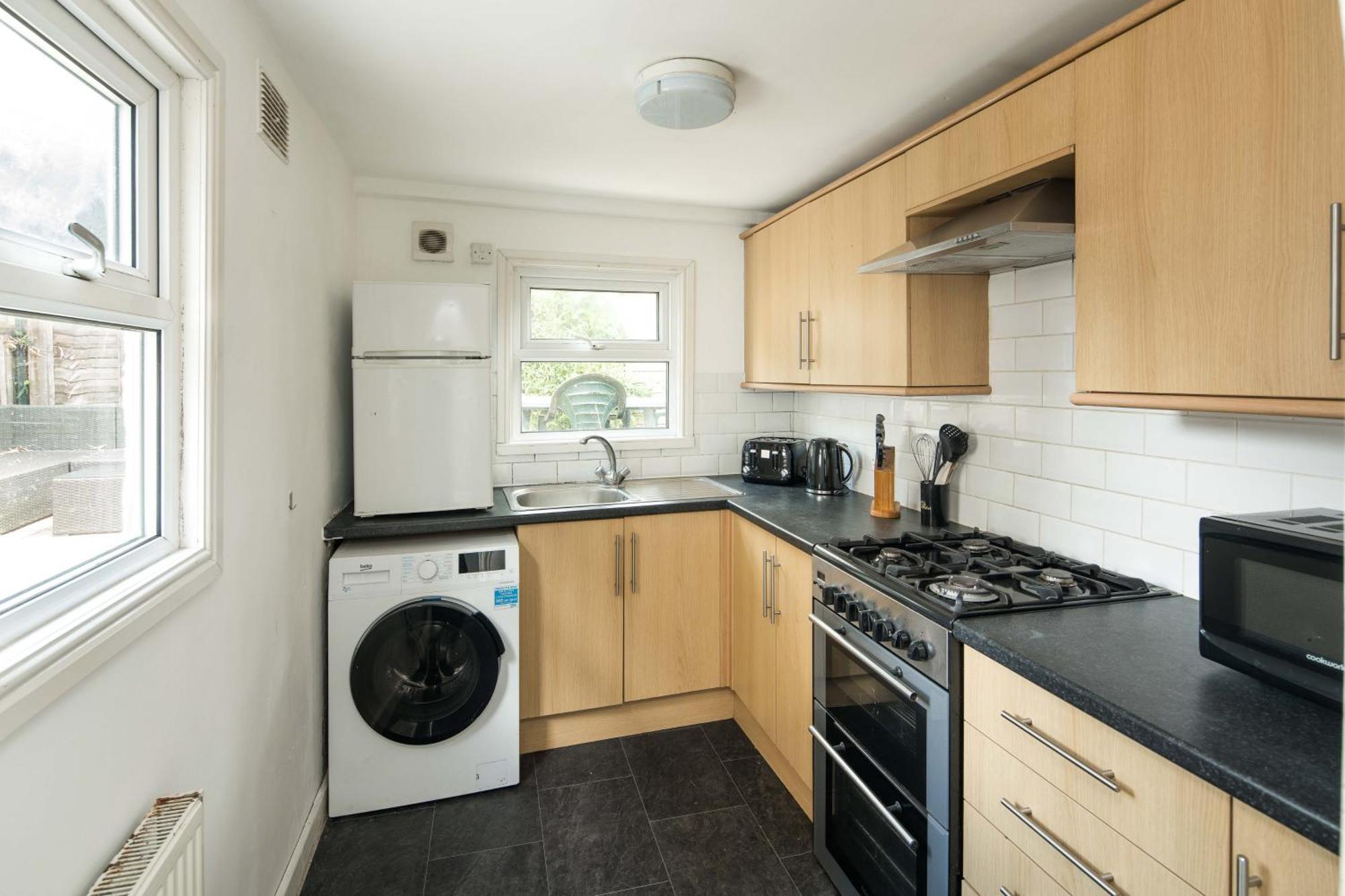 Charming Brixton Flat With Patio & Modern Comforts London