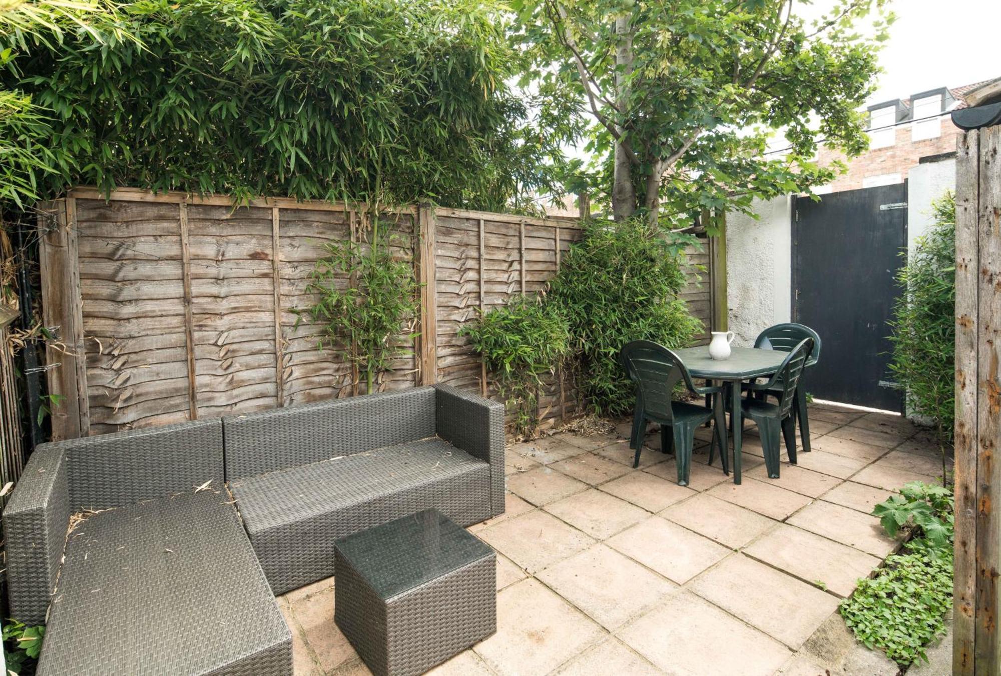 Charming Brixton Flat With Patio & Modern Comforts * London