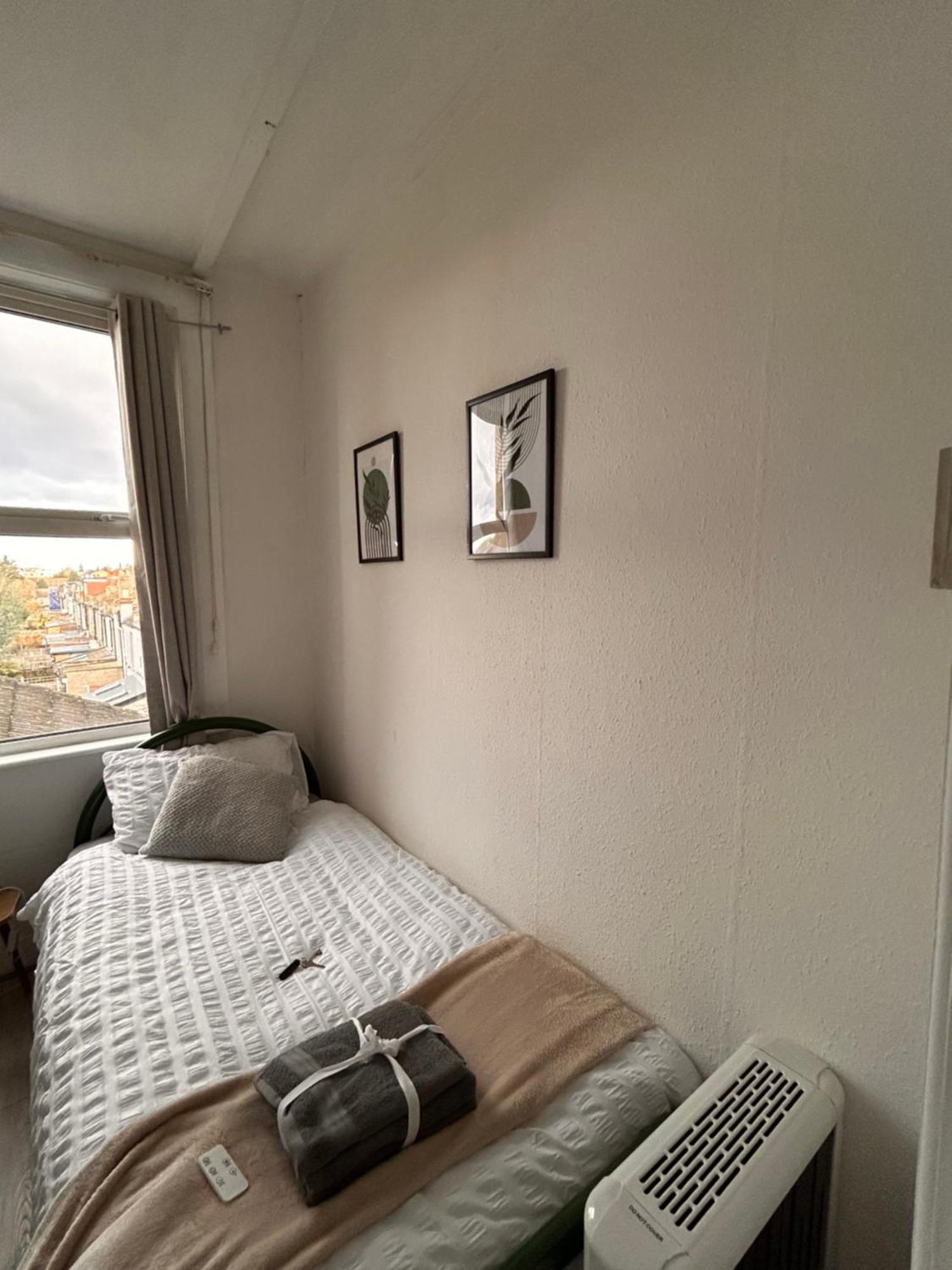 Cozy Single Near Station Hospedagem domiciliar Londres