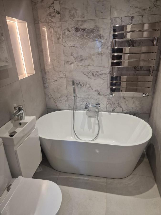 Collier's Wood En-suite Apartamento